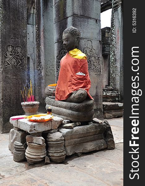 Cambodia Angkor, The Bayon was constructed during the reign of Jayavarman VII and Jayavarman VIII (13th century). The temple is one of the most enigmatic religious constructions in the world. Here a seated buddha. Cambodia Angkor, The Bayon was constructed during the reign of Jayavarman VII and Jayavarman VIII (13th century). The temple is one of the most enigmatic religious constructions in the world. Here a seated buddha