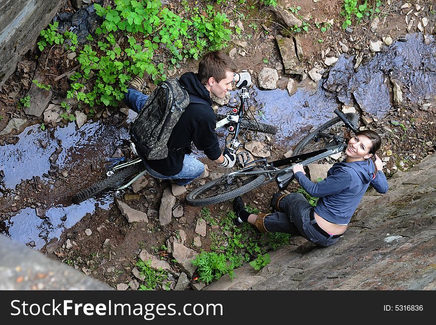 Couple enjoying Walk on bicycles of the outdoors