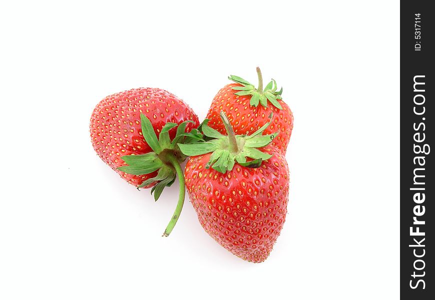 Juicy strawberries isolated over white background, concept of healthy organic, homegrown food and diet. Juicy strawberries isolated over white background, concept of healthy organic, homegrown food and diet.