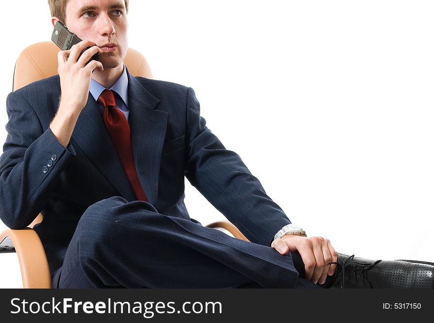 Close-up businessman sitting on an armchair