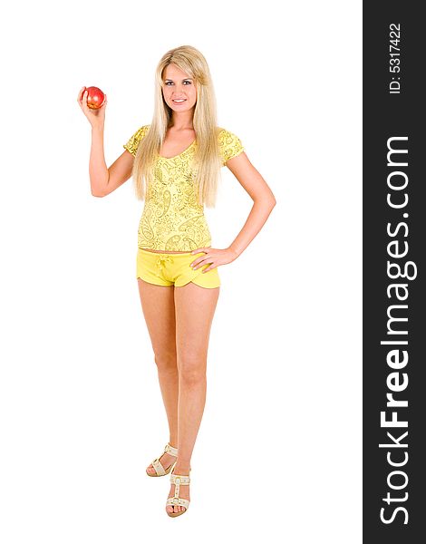 Long haired and long legs blond sportive girl with an apple. Long haired and long legs blond sportive girl with an apple