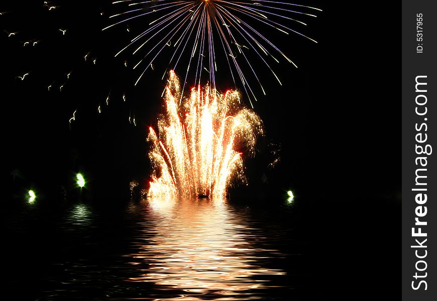 Fireworks Reflected In Water Background