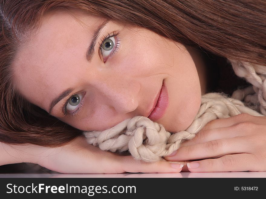 Beautiful young a woman with shawl in closeup