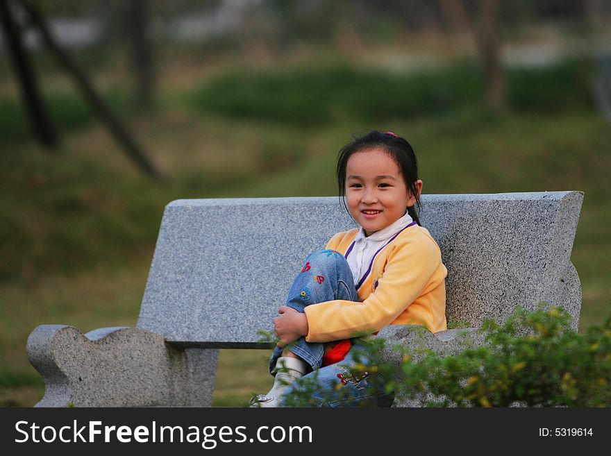 The cute girl in a park. The cute girl in a park.