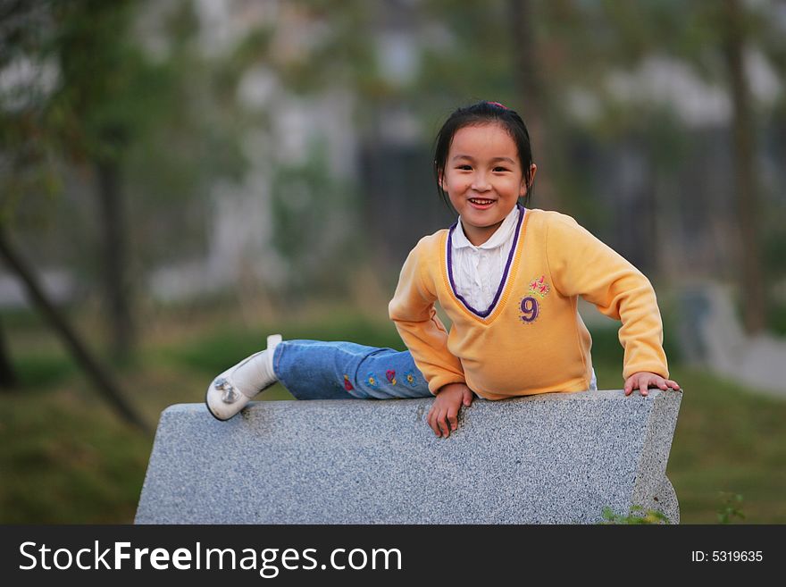 The cute girl in a park. The cute girl in a park.