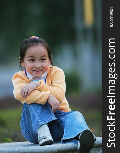 The cute girl in a park. The cute girl in a park.