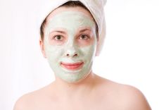 Young Woman With Green Mask On Her Face Stock Image Young Woman With Green Mask On Her Face Stock Image