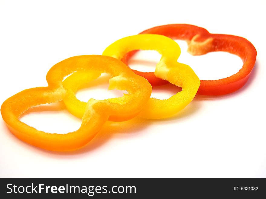 Pepper rings on a white background.