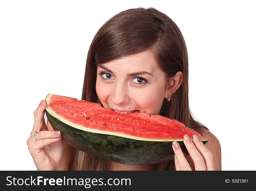 Girl eats the big piece slice of water-melon (citrullus). Girl eats the big piece slice of water-melon (citrullus)