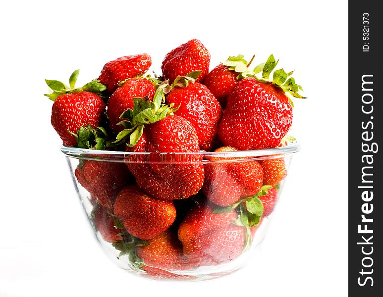 An image of big red strawberries in glass. An image of big red strawberries in glass