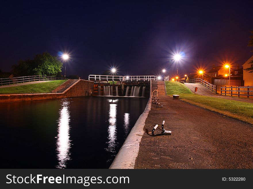 A view of the canal locks at night - long exposure. A view of the canal locks at night - long exposure