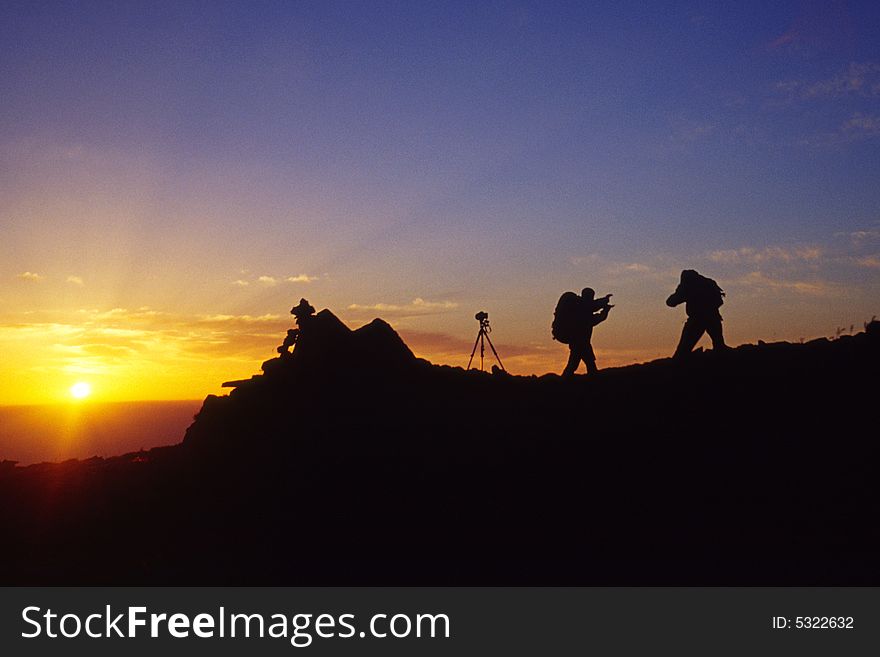 Hikers silhouette in sunset, xiaowutai mountain, china. Hikers silhouette in sunset, xiaowutai mountain, china