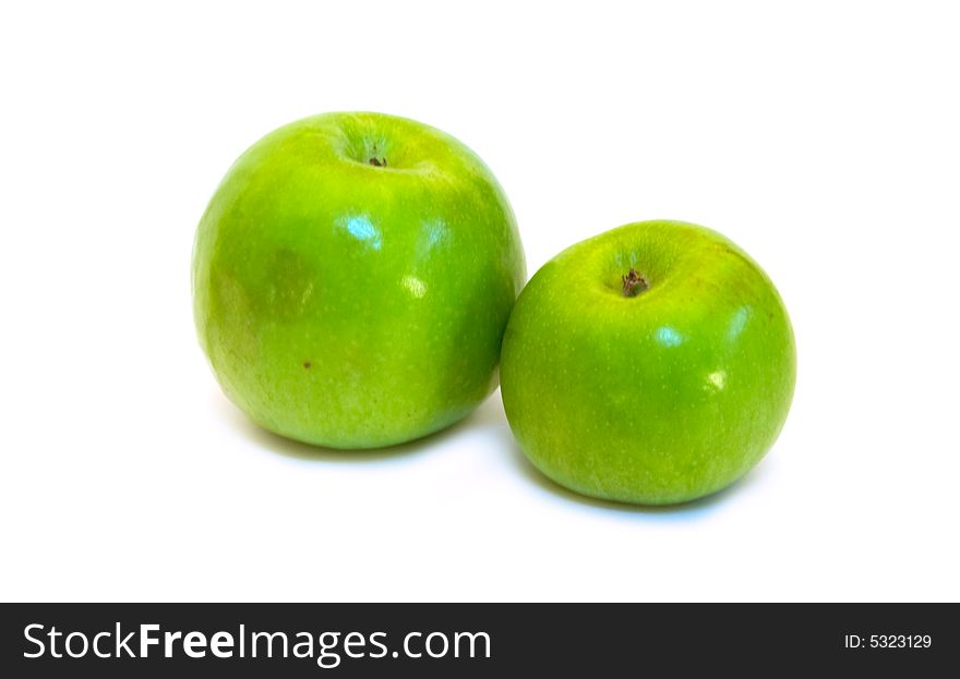 Two green apples on white background (isolated)