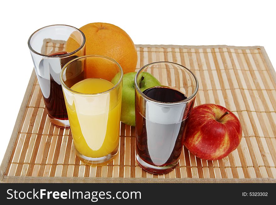 Three glass of juice and green, red apple, grapefruit. Three glass of juice and green, red apple, grapefruit