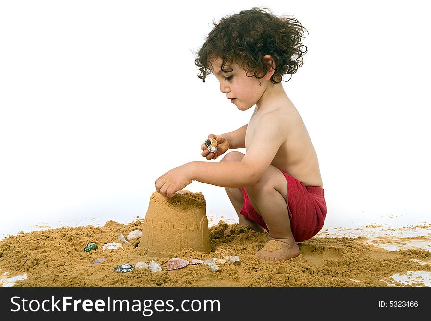 Boy playing in the sand