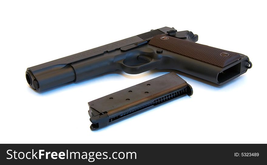 Black pistol with magazine (isolated)
