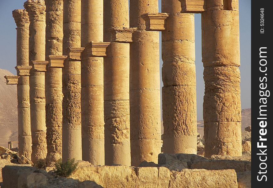 Ancient ruins in Palmyra in desert, Syria. Ancient ruins in Palmyra in desert, Syria