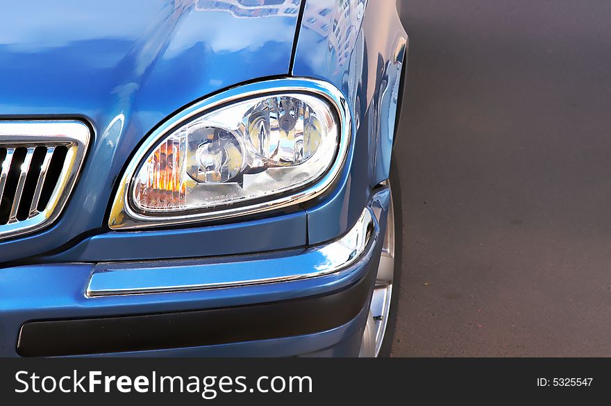 Headlight of the car close-up (isolated)