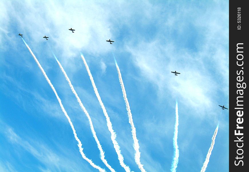 Six jets put on an airshow. Six jets put on an airshow