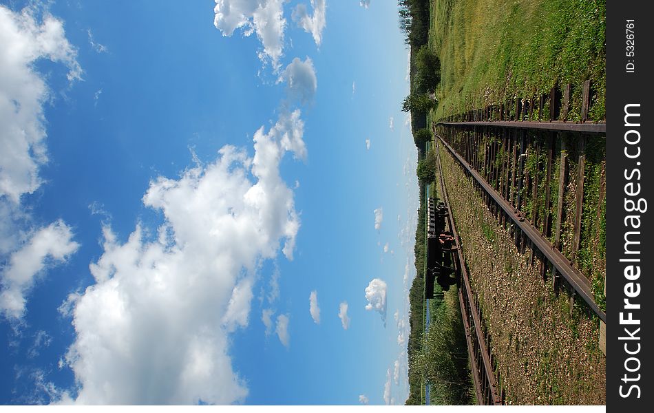 Railway and train under sky. Railway and train under sky