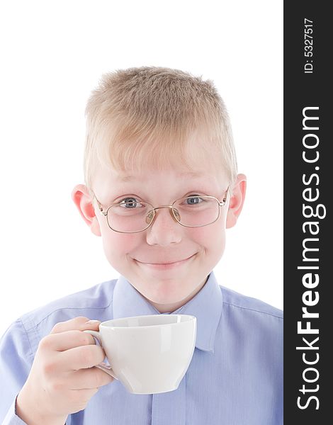 Boy enjoying a nice warm cup of coffee. Isolated on white background