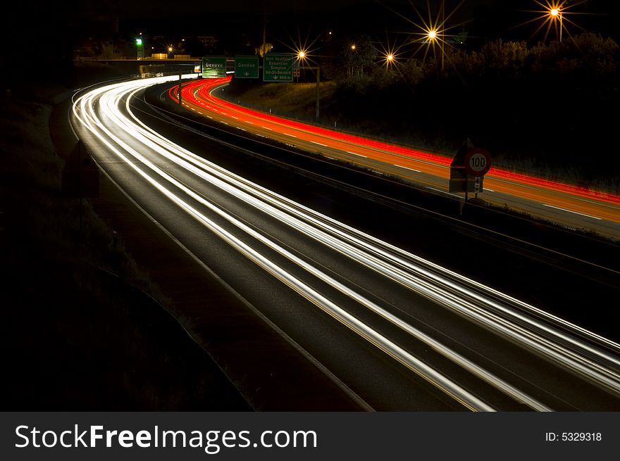 Lightnig of freeway traffic by night. Lightnig of freeway traffic by night