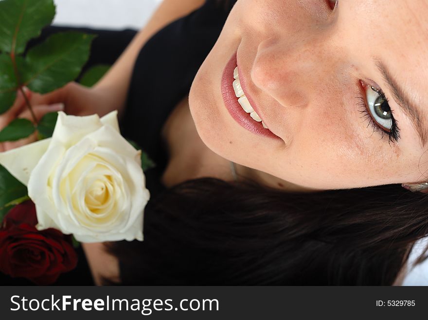Very nice women and her white rose. Very nice women and her white rose