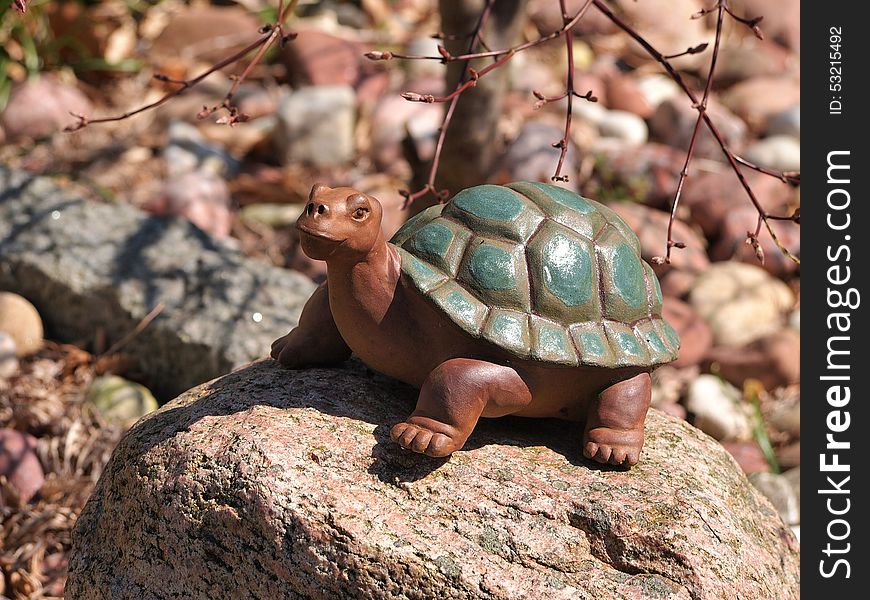 Stone turtle statue in a garden