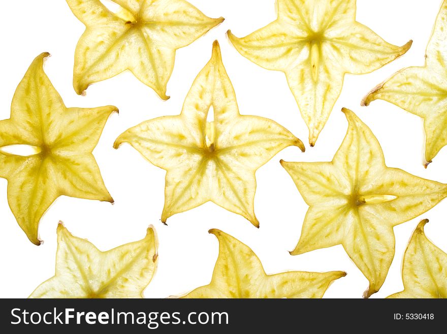 Sliced carambola on a white background. Close up.