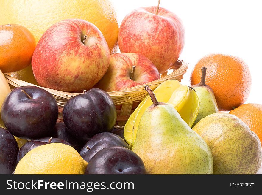Various fresh fruits on a white background. Various fresh fruits on a white background