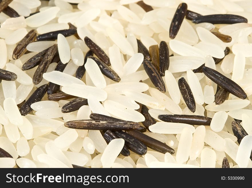 Background from a raw rice. Close up. Background from a raw rice. Close up.