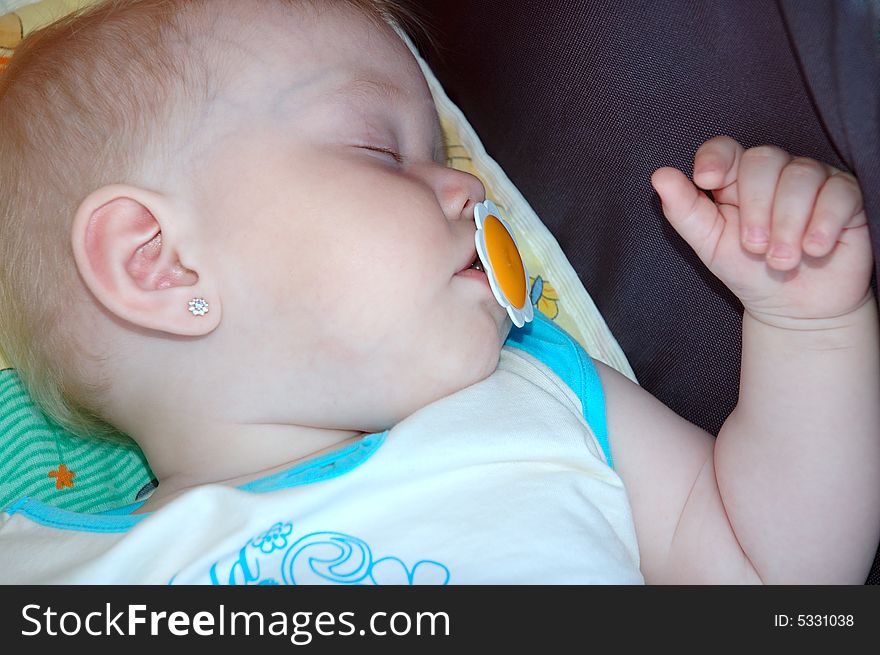 Little Girl Sleep In Carriage.