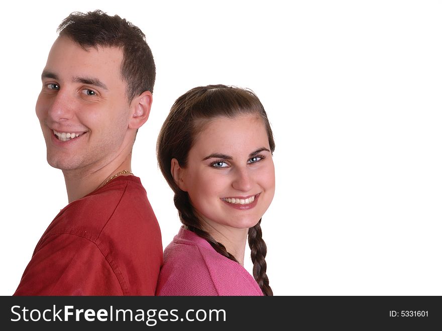 Attractive young couple back to each other, playfully joking - on white. Attractive young couple back to each other, playfully joking - on white