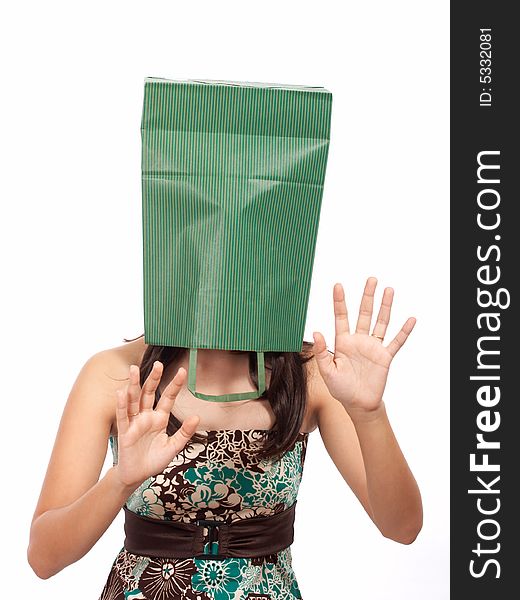Shopping girl cover her head with green bag