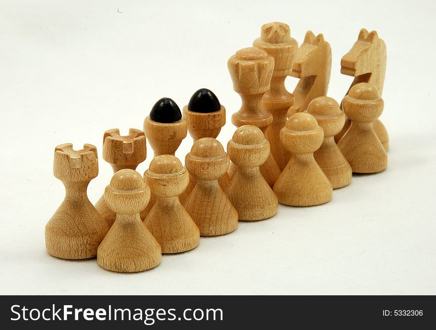 In a row - white chessmen (draughtsmen)