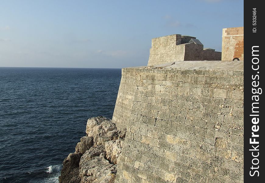 The Morro Fortress wall and a blue sea, Cuba