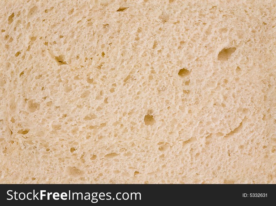 Closeup of the Texture of White Bread for use as Background. Closeup of the Texture of White Bread for use as Background