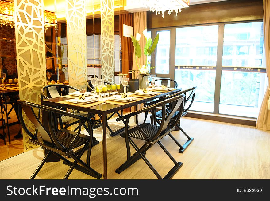 The family table setting in the dinning room.