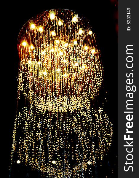 The pendant lamp  looks like stars in a upscale hotel lobby.