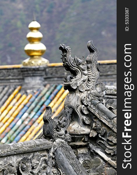 Exquisite eave and ornamental on the roof of ancient temple.