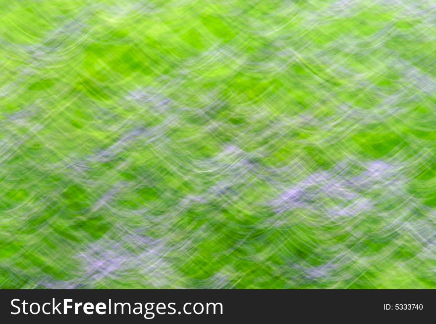 Motion blur of field of lavender creating abstract pattern. Motion blur of field of lavender creating abstract pattern