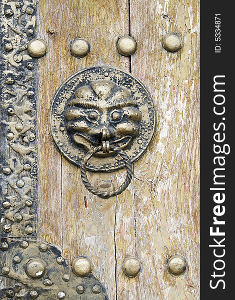 Knocker on the ancient door.