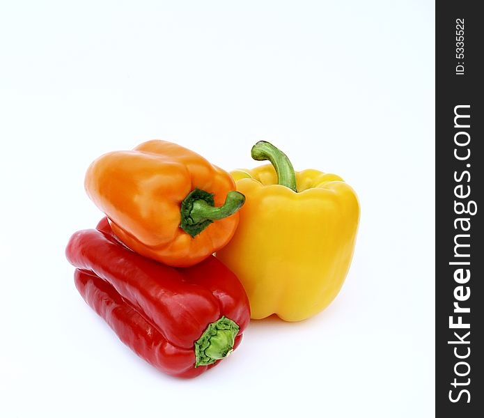 Three peppers in diferent colors. Three peppers in diferent colors