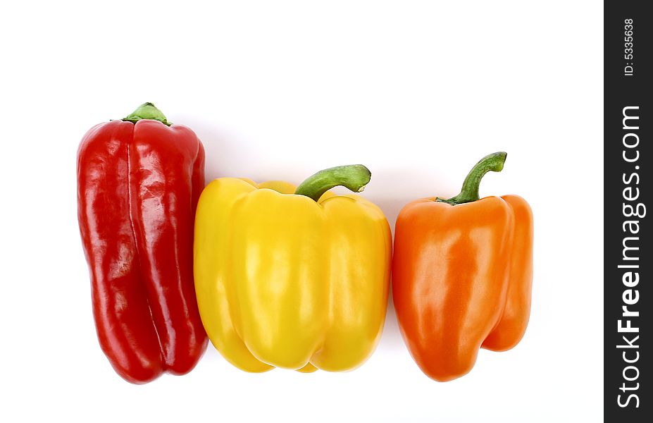Three peppers in diferent colors