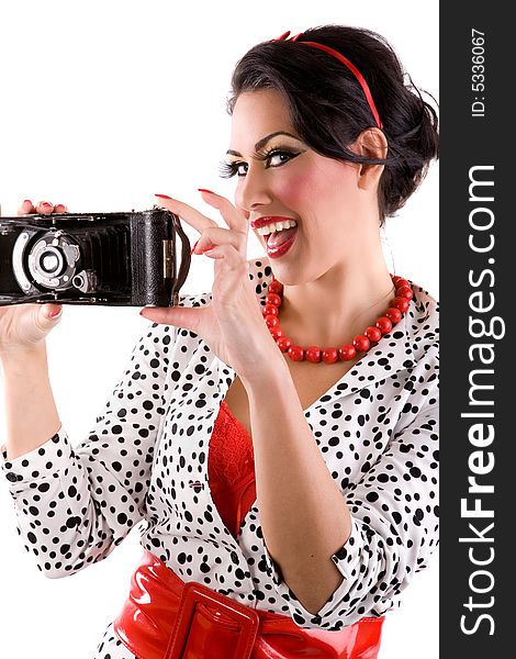 Beautiful woman holding retro camera. Beautiful woman holding retro camera