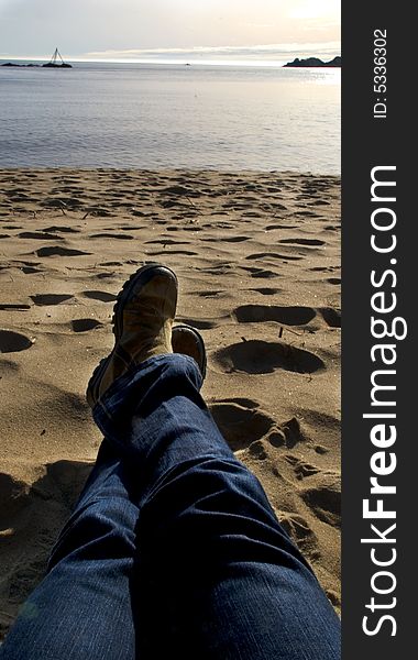 Girl relaxing on the beach in Mandal, Norway. Girl relaxing on the beach in Mandal, Norway