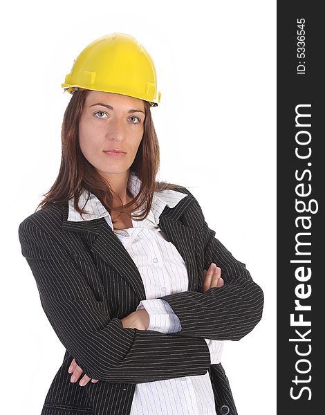 Young businesswoman with helmet on white background