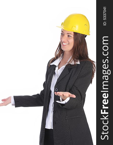 Young businesswoman with helmet on white background