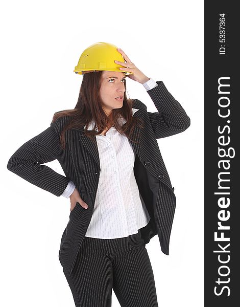 Young businesswoman thinking with helmet on white background