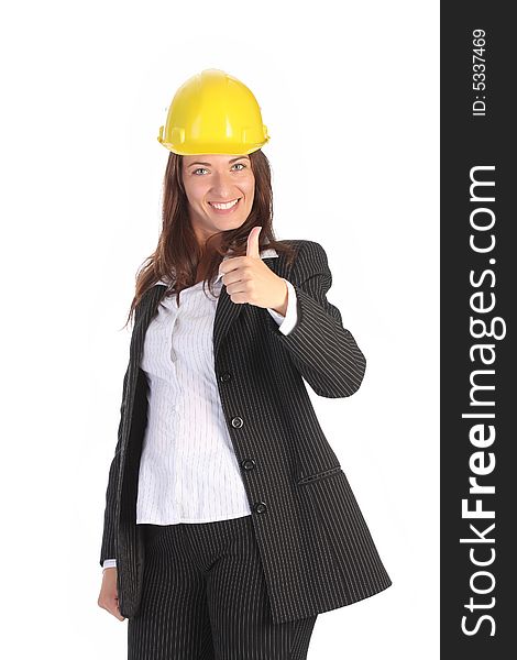 Young businesswoman with helmet on white background